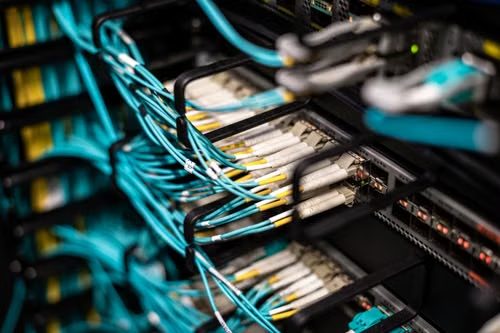 IT technician servicing network hardware